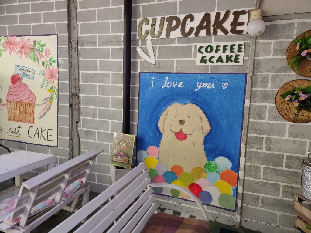 Beautiful dog mural at Cupcake Cafe